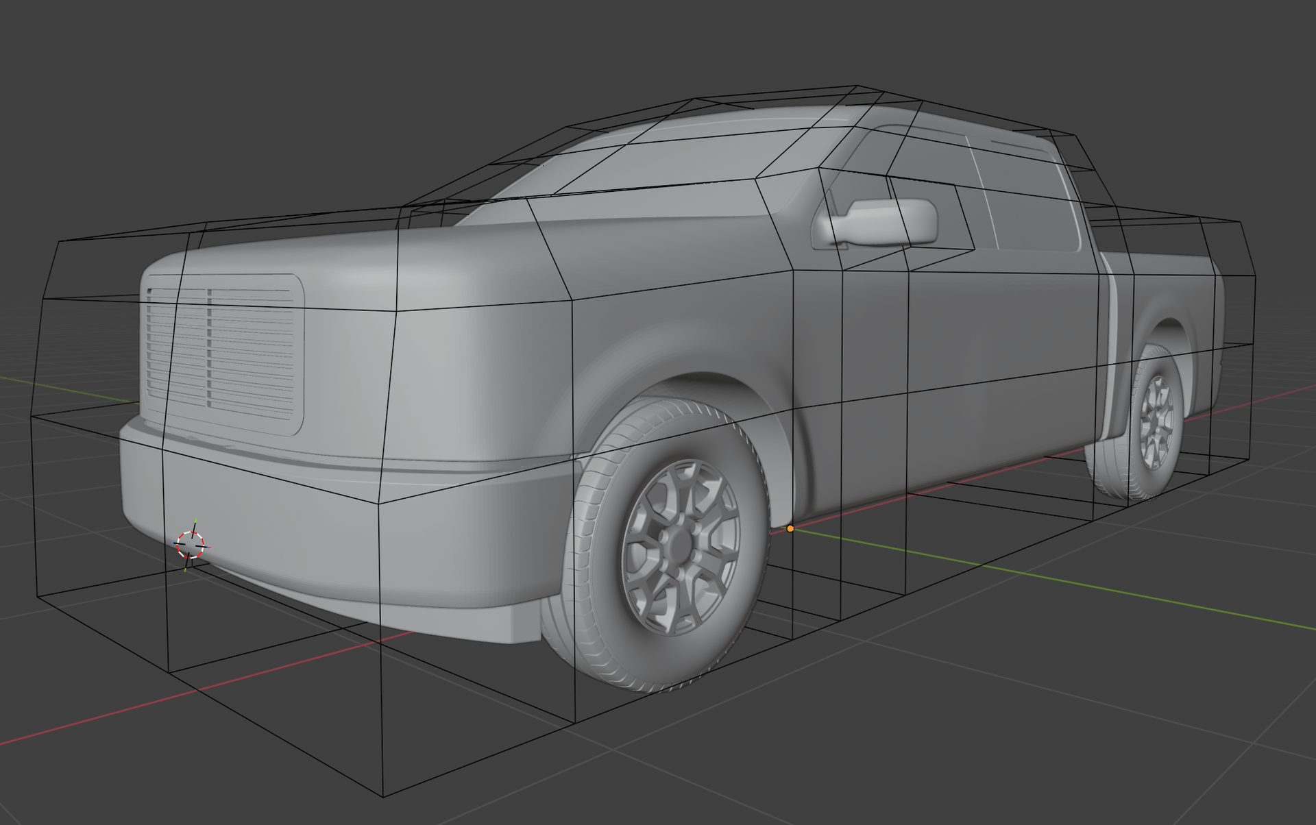 The baseline truck geometry in Blender, enclosed by the box-shaped deformation cage used to generate variants.